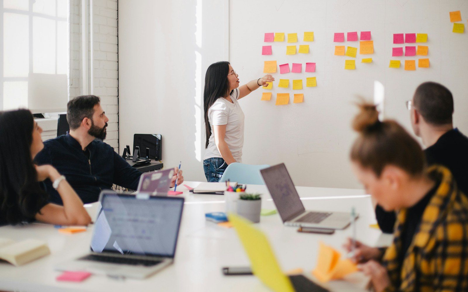 Team reviewing notes together during a planning session